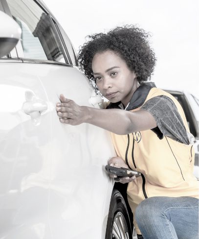 Woman Looking at a Car